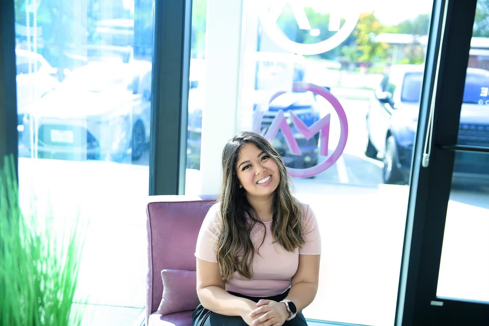 Sue seated inside Mattison Avenue Salon Suites and Spa